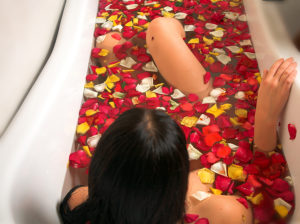 bigstock_Woman_In_A_Rose_Petal_Bath_854326