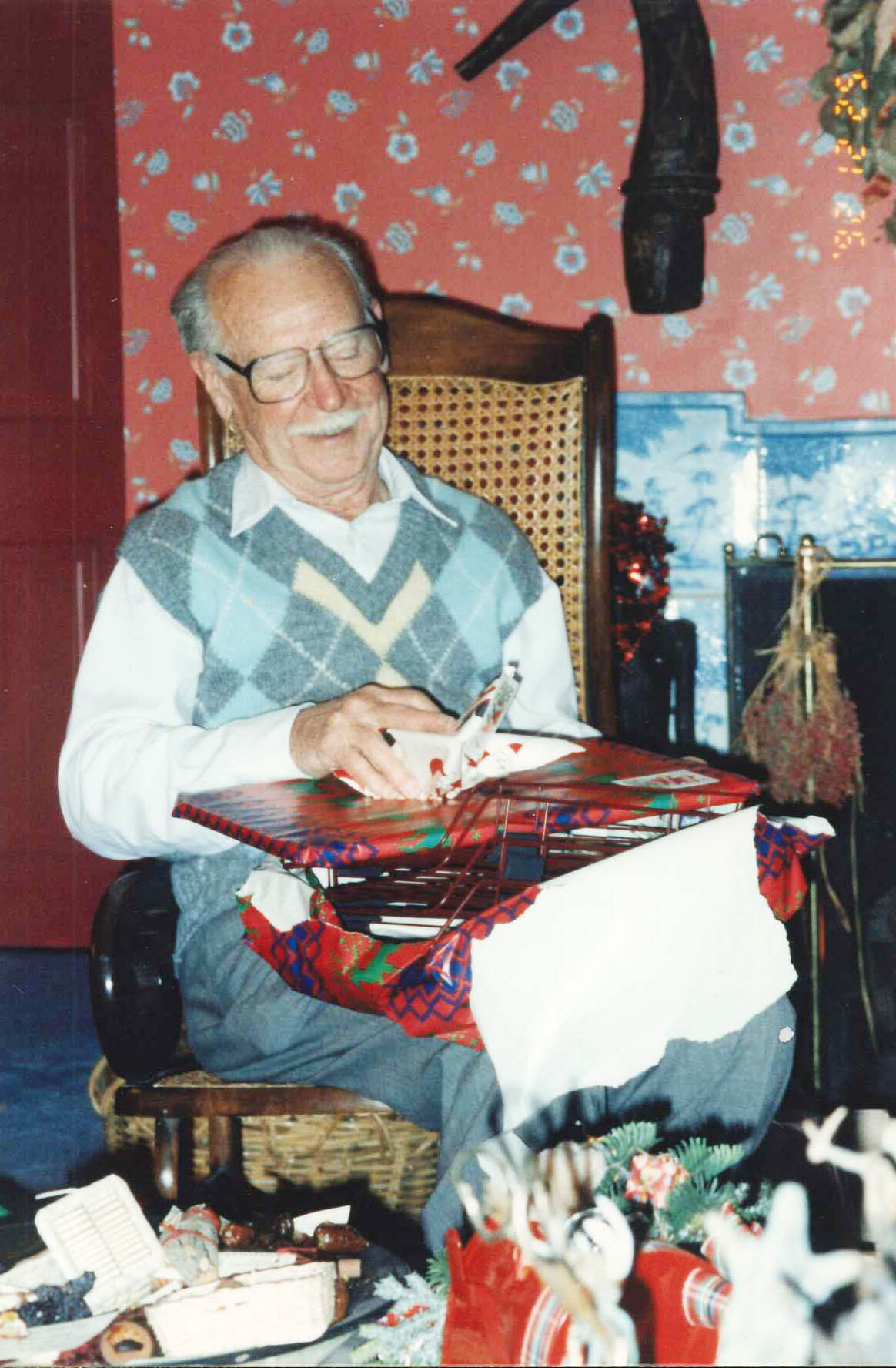 Papa opening Christmas presents