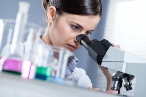 bigstock-Female-Researcher-Using-Micros-60140795